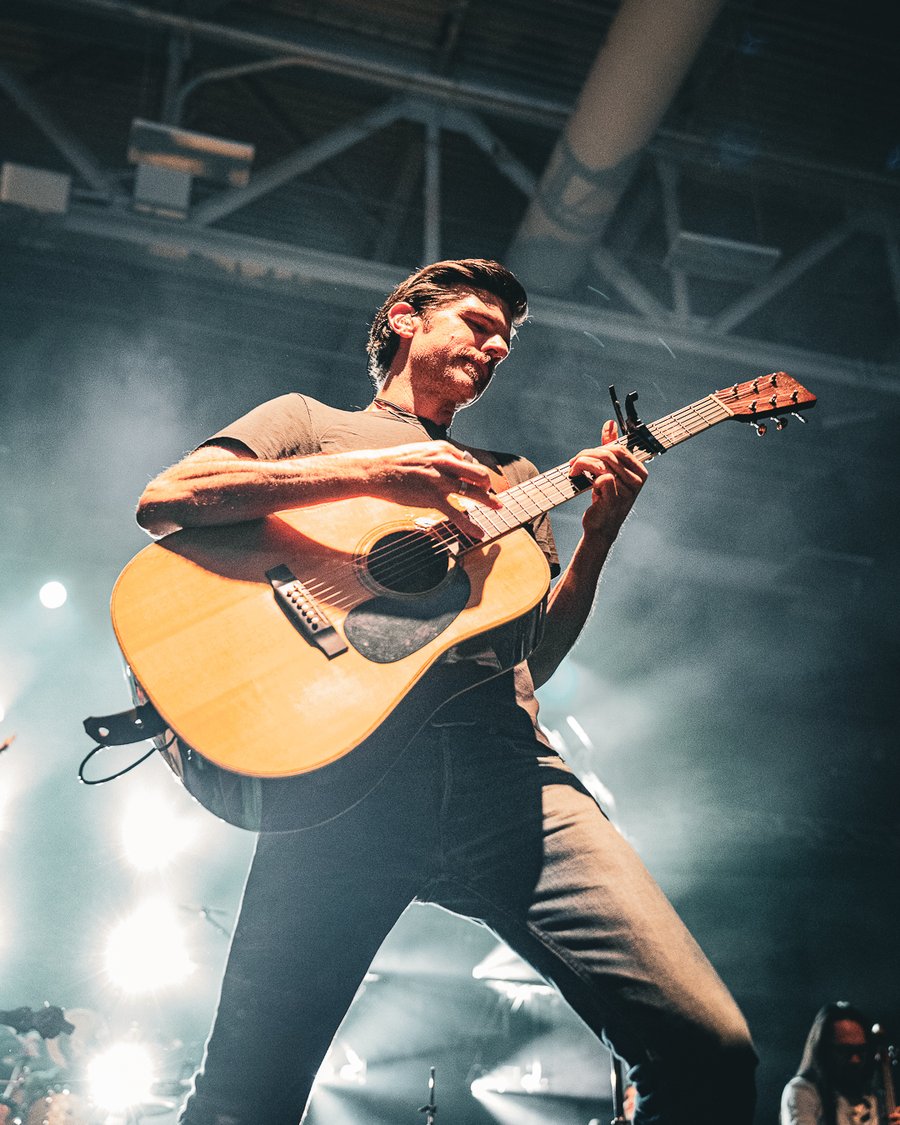 Avett Brothers guitarist performing, Durham, NH