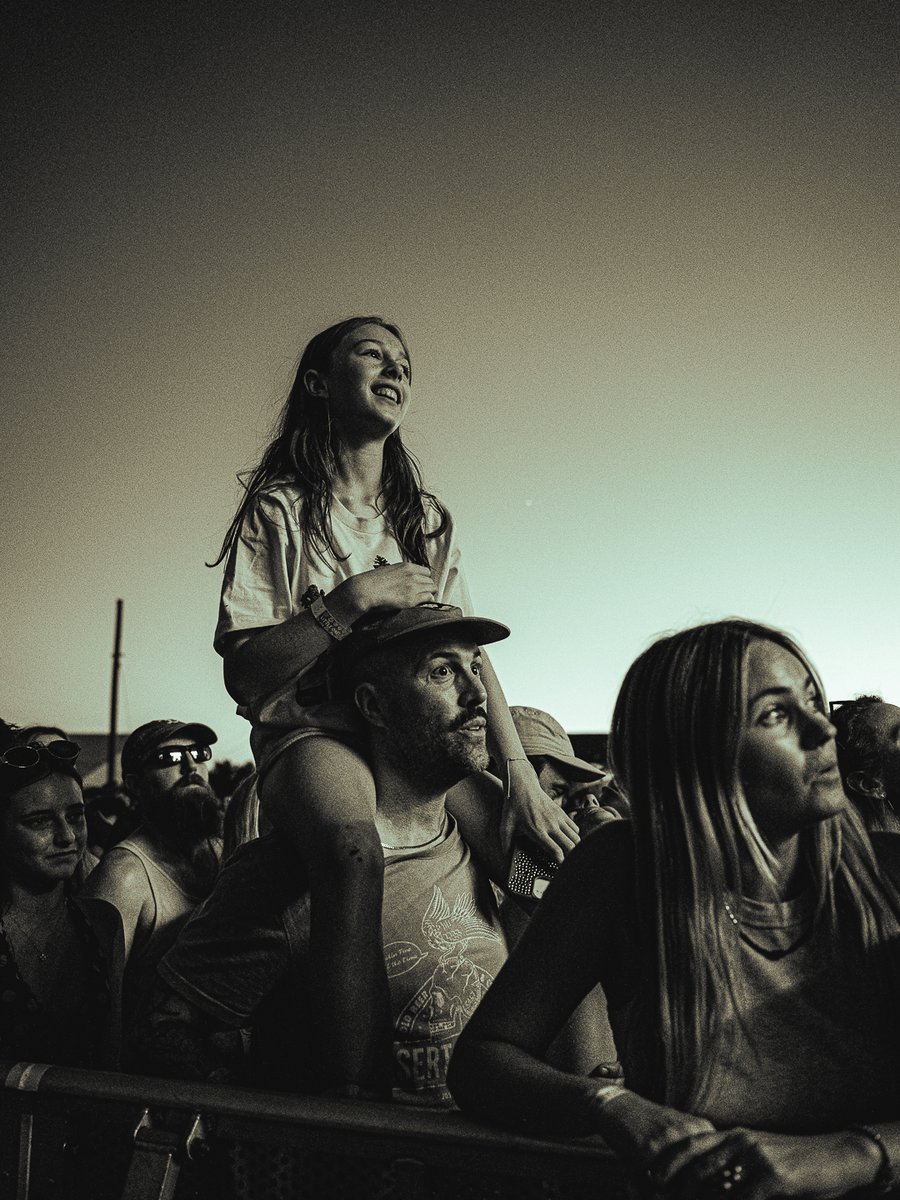 Fan on shoulders in the crowd at Levitate Music Festival, Marshfield, MA