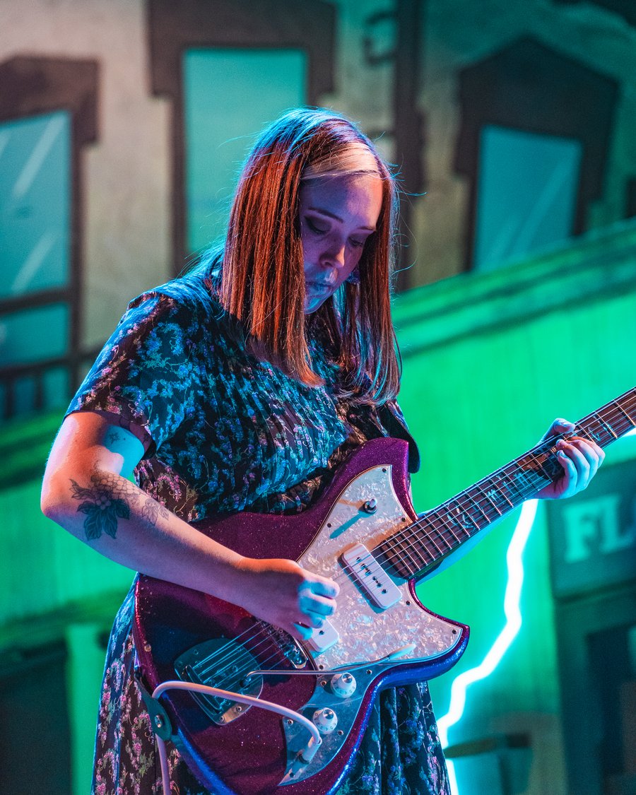 Soccer Mommy guitarist under green stage light, Portsmouth, NH