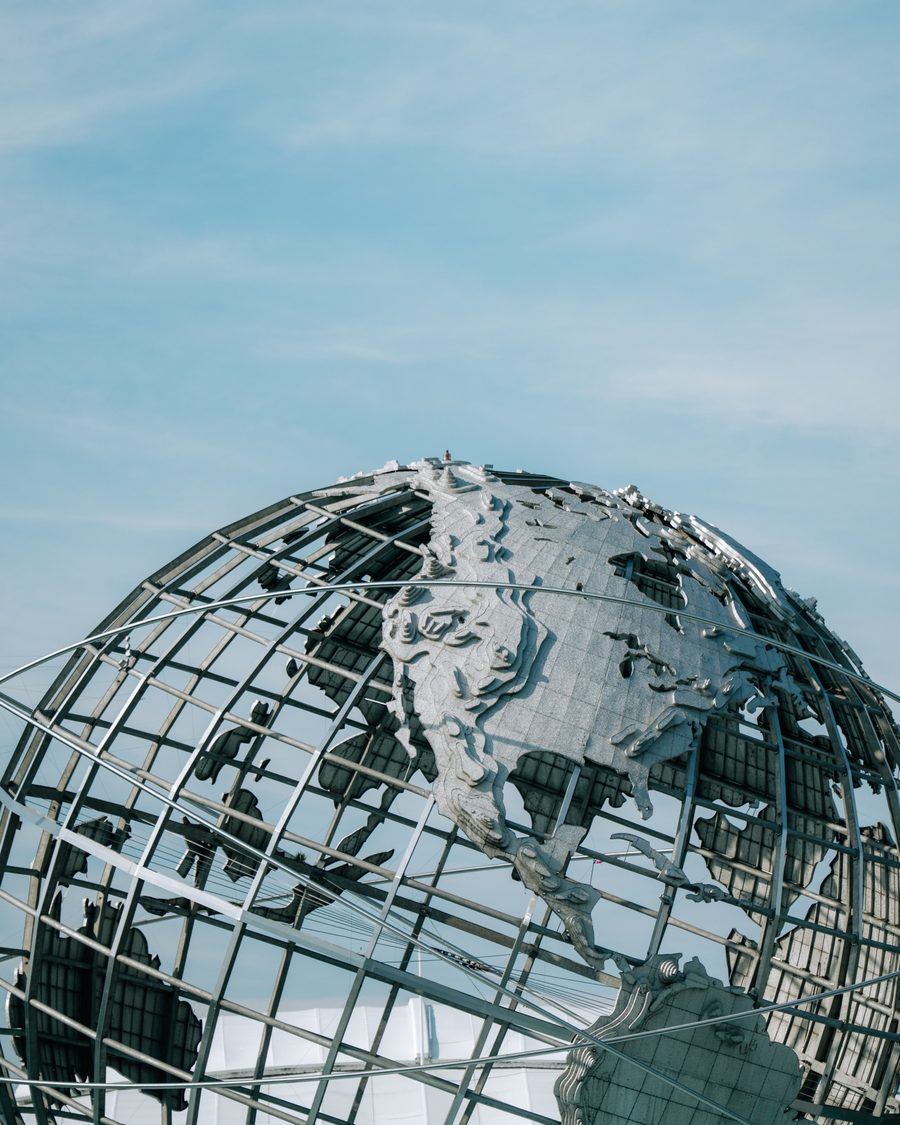 The Unisphere globe against a blue sky at Flushing Meadows Corona Park, Flushing, NY