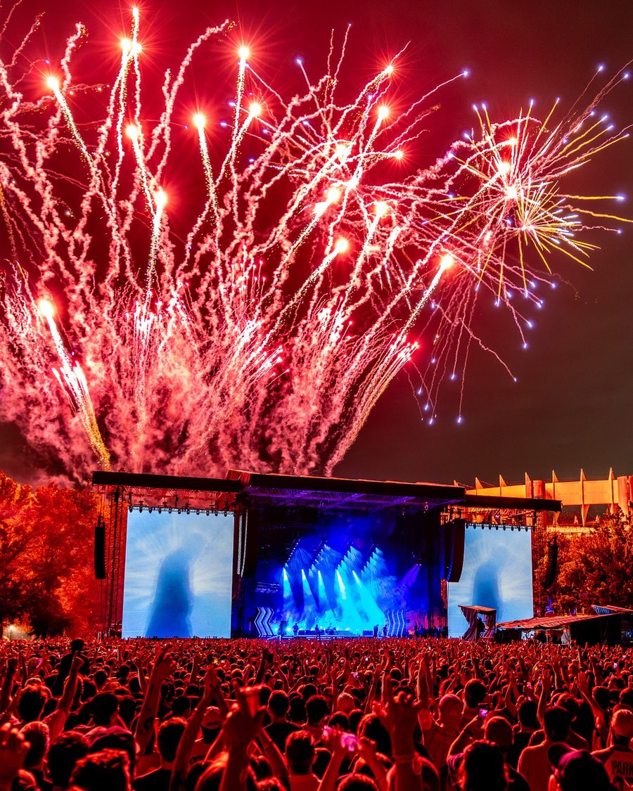 Fireworks over the main stage and crowd at The Strokes: Reality Awaits, Flushing Meadows Corona Park, Flushing, NY