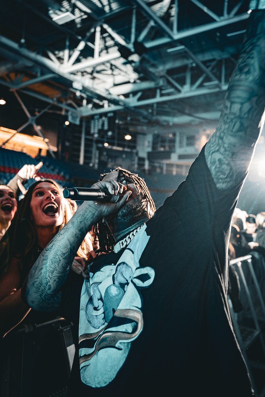Waka Flocka Flame performing with a fan reaching up, Durham, NH